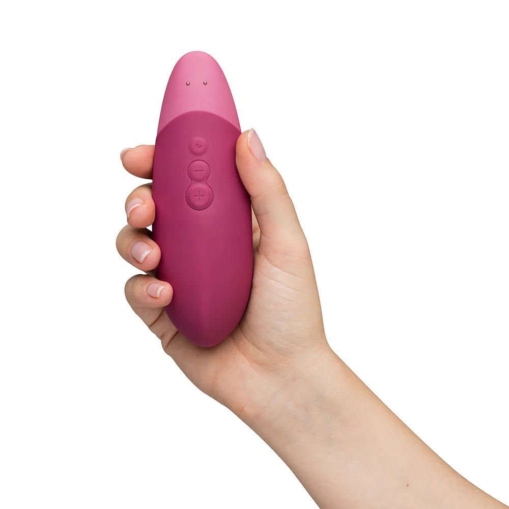 Womanizer Vibe Silent Clitoral Vibrator Dusty Pink - Rolik®