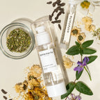 Skincare products with natural elements on a light background