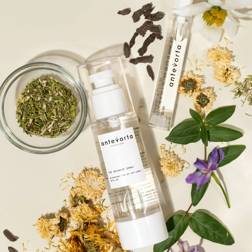 Antevorta skincare products with herbs and flowers on a light background
