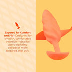 B-Vibe™ b-Vibe Swirl Texture Plug, Medium Vibrating Silicone Butt Orange