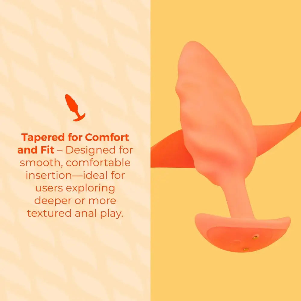 B-Vibe™ b-Vibe Swirl Texture Plug, Medium Vibrating Silicone Butt Orange