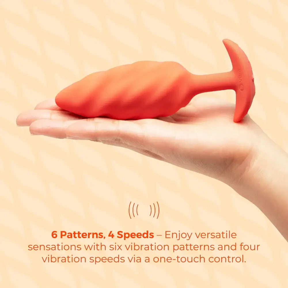 B-Vibe™ b-Vibe Swirl Texture Plug, Medium Vibrating Silicone Butt Orange