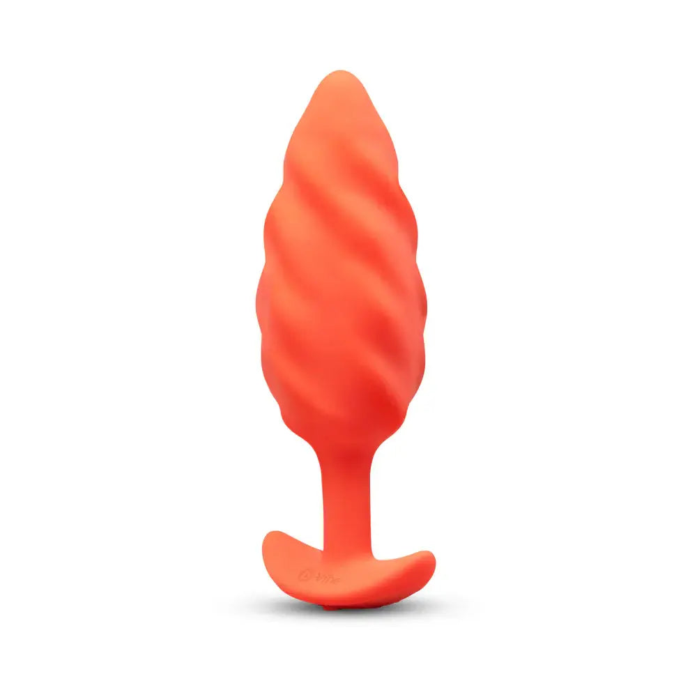 B-Vibe™ b-Vibe Swirl Texture Plug, Medium Vibrating Silicone Butt Orange
