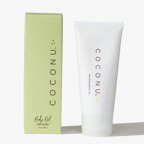 COCONU baby oil packaging including a tube and box on a white background