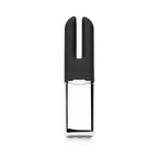 A sleek, modern personal care device with a matte black silicone top and a polished silver metallic body, shown against a solid white background.