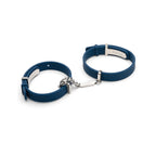 Pair of blue handcuffs with silver clasps on a white background