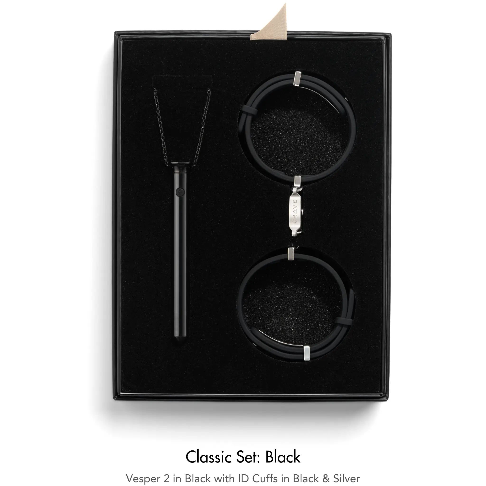 Black jewelry set with 'Vesper 2' and 'ID Cuffs' in a black box on a white background.