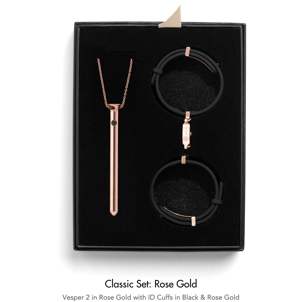 Jewelry set with necklace and bracelets in rose gold and black packaging