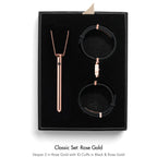 Jewelry set with necklace and bracelets in rose gold and black packaging