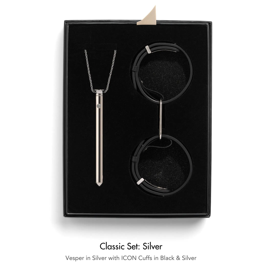 Jewelry set with necklace and cuffs in a black box, labeled 'Classic Set: Silver'.