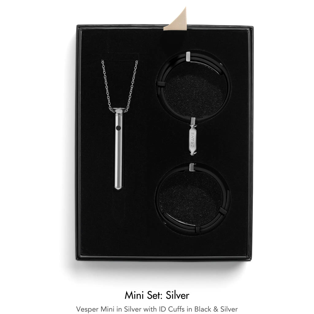 Jewelry set with necklace and cuffs in a black box, labeled 'Mini Set: Silver'.
