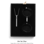 Jewelry set with necklace and cuffs in a black box, labeled 'Mini Set: Silver'.