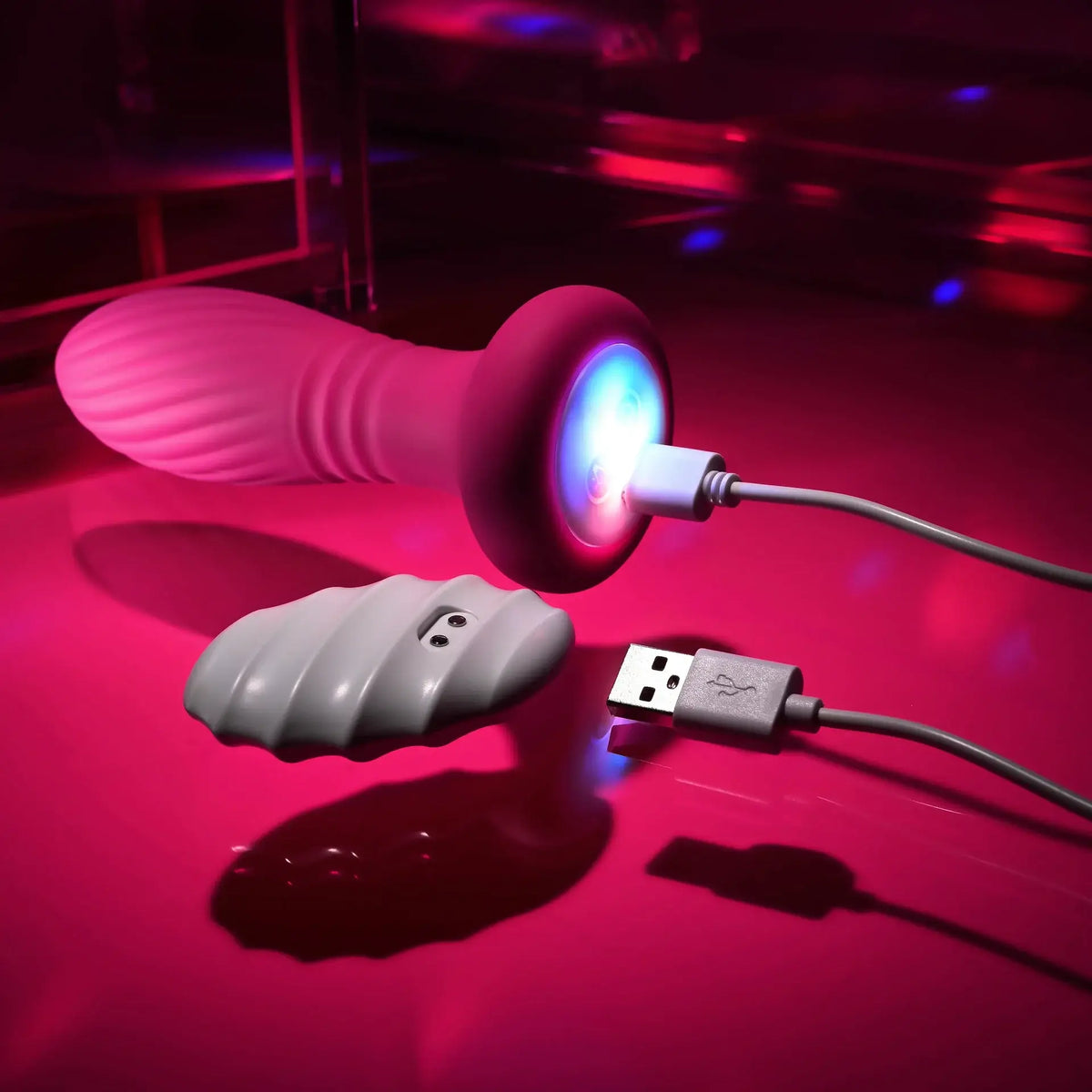 Evolved® Novelties Evolved LED Party Thrusting Butt Plug with Remote Cerise