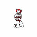 Illustration of a clown with red hair and white face, bound with rope on a white background
