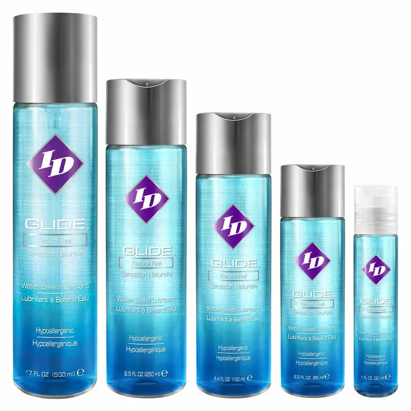 Set of blue ID Glide personal lubricant bottles on a white background
