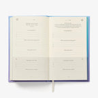 Open book with text on a white background