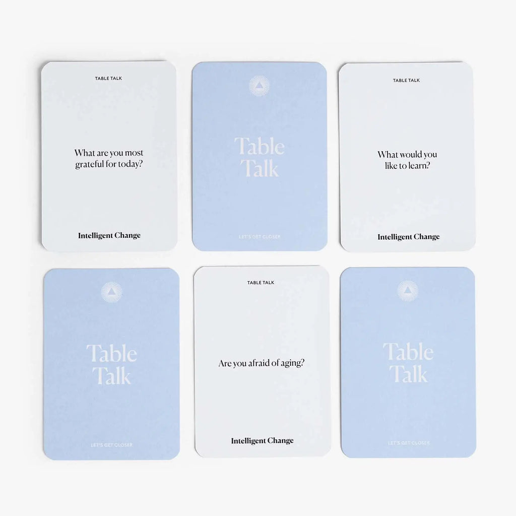 Set of six 'Table Talk' cards with questions on a white background