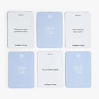 Set of six 'Table Talk' cards with questions on a white background