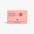 Pink packaging of 'Get Closer' product by Intelligent Change on a white background