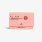 Pink packaging of 'Get Closer' product by Intelligent Change on a white background