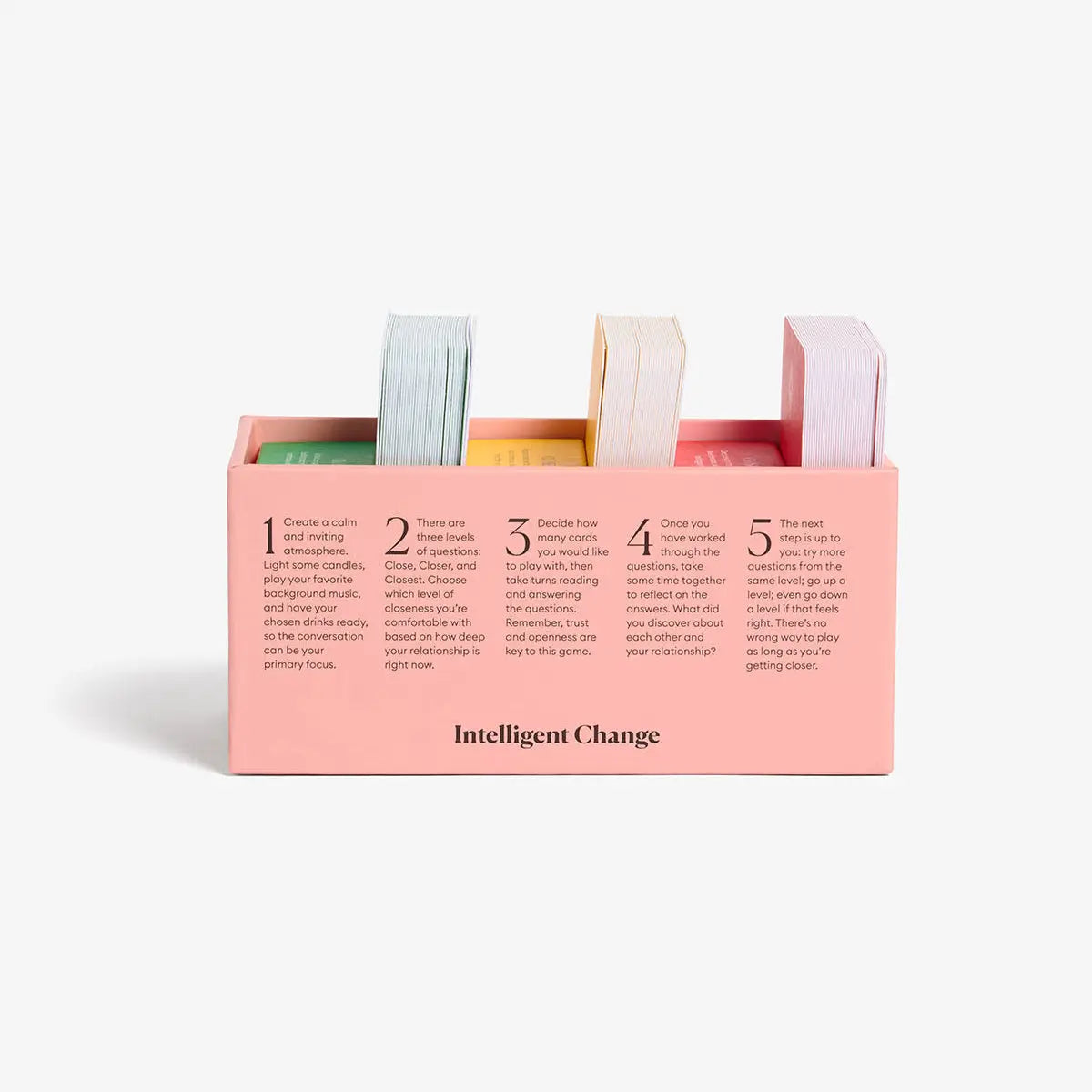 Pink desk organizer with colorful markers and 'Intelligent Change' branding on a white background