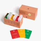 Color swatch cards with 'Closest', 'Closer', and 'Close' labels in a cardboard box on a white background.