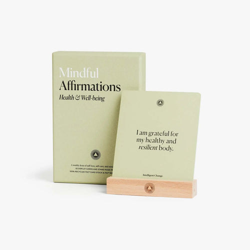 Mindful Affirmations book with a wooden stand on a white background