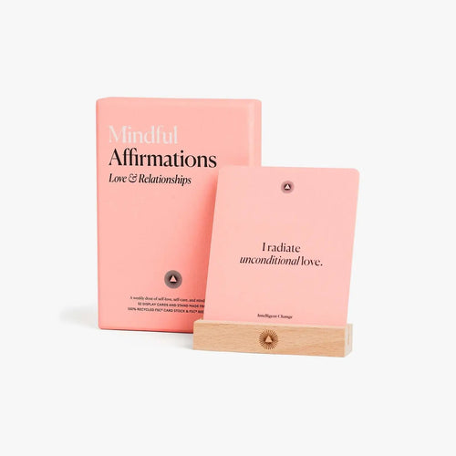 Pink book titled 'Mindful Affirmations Love & Relationships' with a wooden cover on a white background