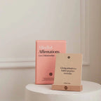Two books titled 'Mindful Affirmations' and 'Allowing attitude is a habit practice everyday' on a white surface.