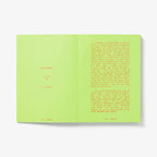 Open book with green pages on a white background