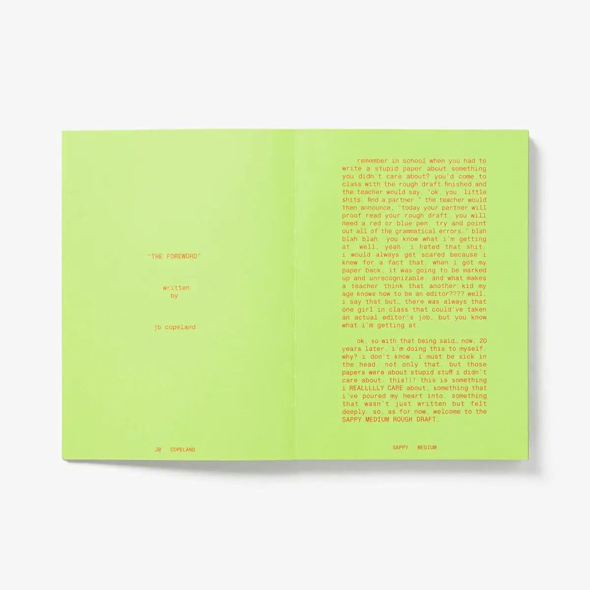 Open book with green pages on a white background