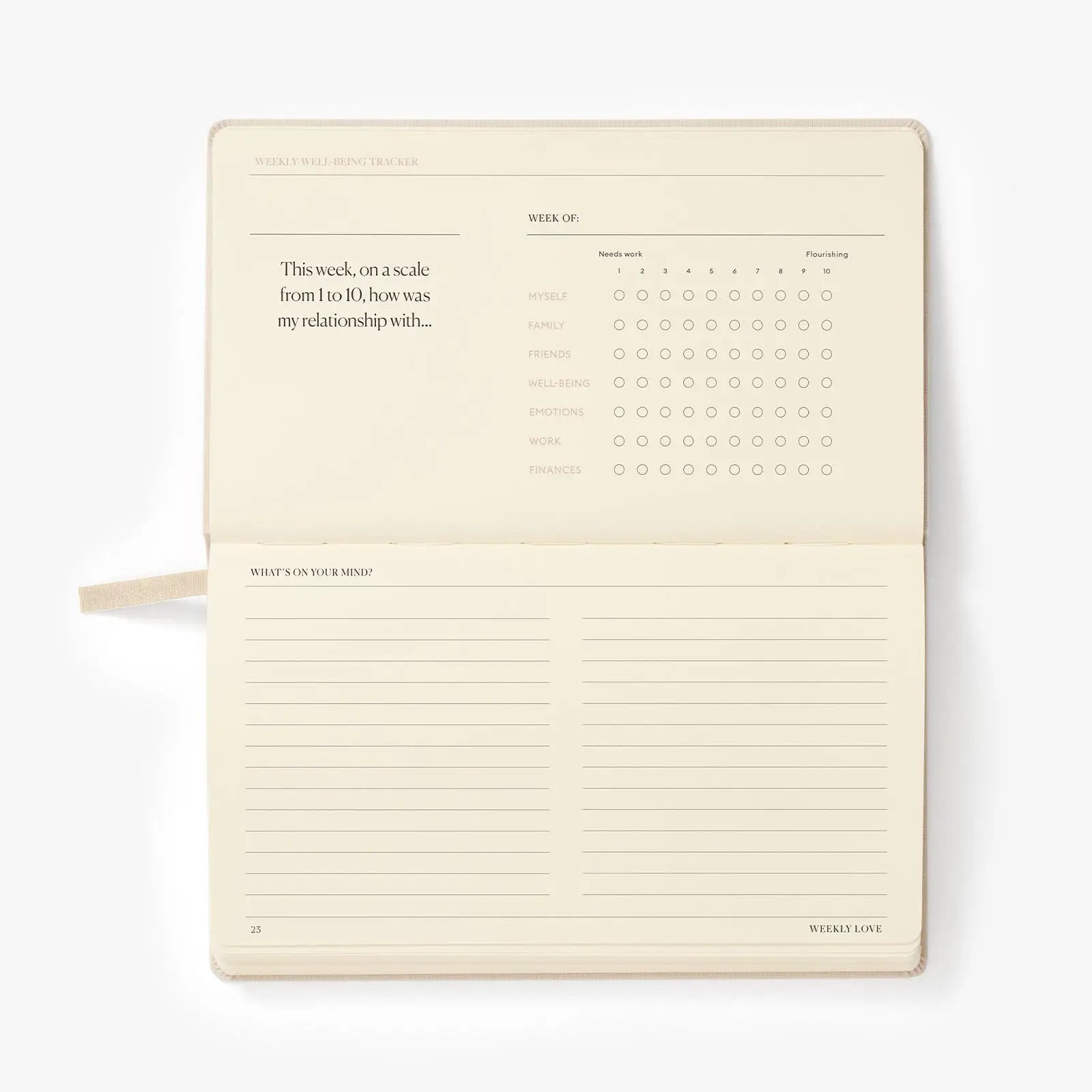  cream colored planner with a calendar and lined pages on a white background