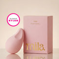Pink product and packaging with 'mila' branding on a beige background, featuring 'As Loved by Nylon' logo.