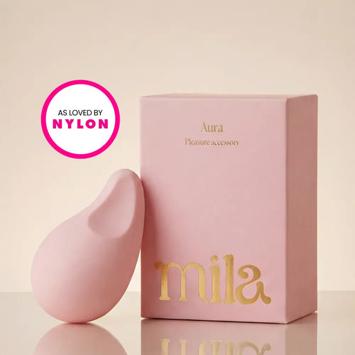 Pink product and packaging with 'mila' branding on a beige background, featuring 'As Loved by Nylon' logo.