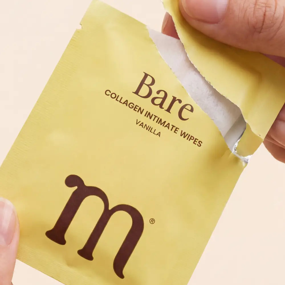 Yellow package of Bare COLLAGEN INTIMATE WIPES Vanilla with 'm' logo on a beige background