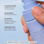 Hand holding a blue skincare product with text on a light blue background