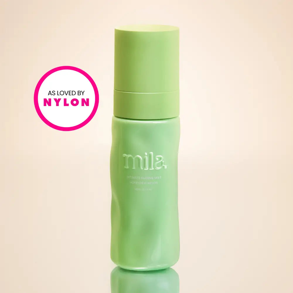 Green bottle with 'mila' branding on a beige background, featuring 'As Loved by Nylon' logo.