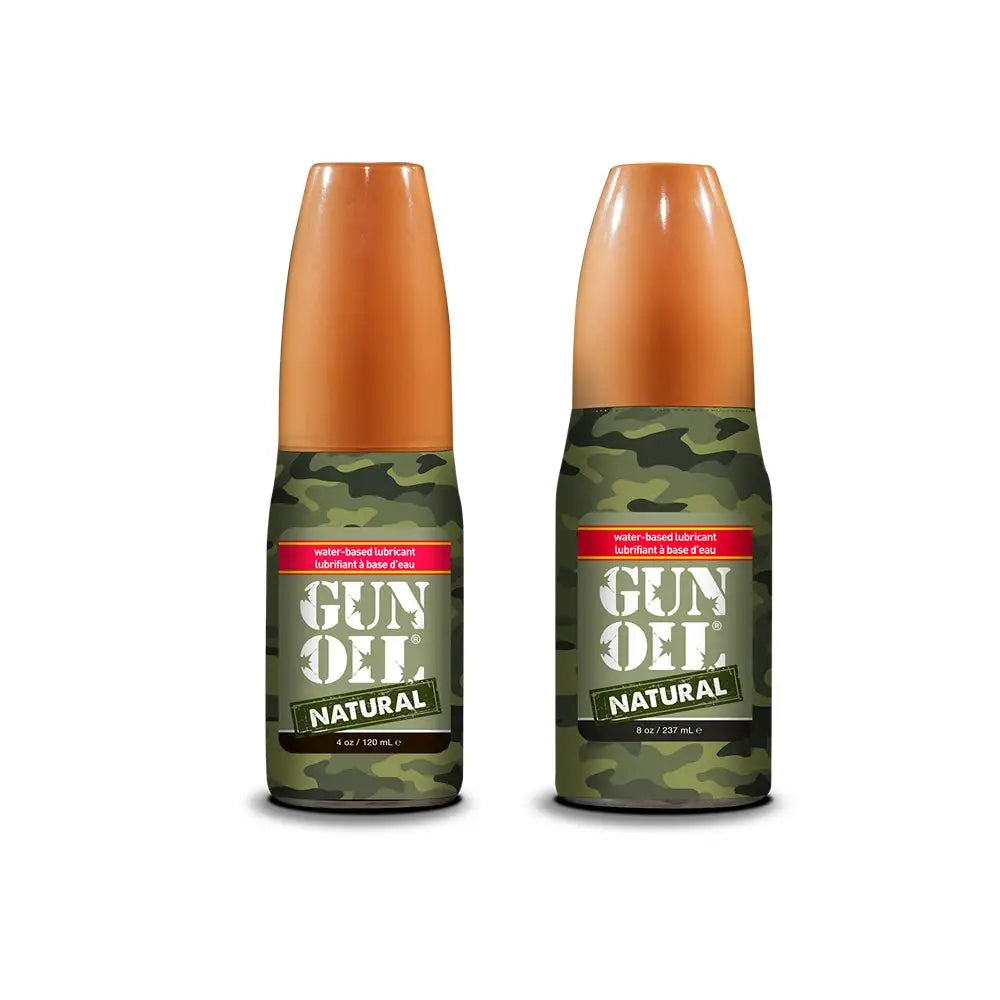 Two bottles of Gun Oil Natural on a white background