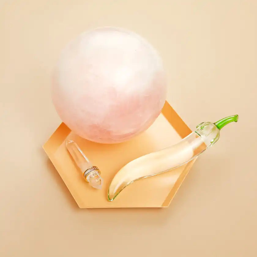 Pink and white fluffy cotton candy sphere.