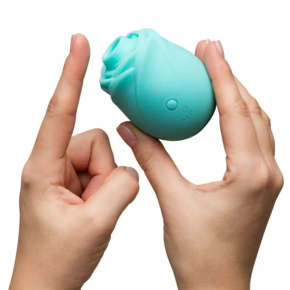 ROMP™ ROMP Rose Glow Clitoral Stimulator – Pleasure Air in the Dark Blue