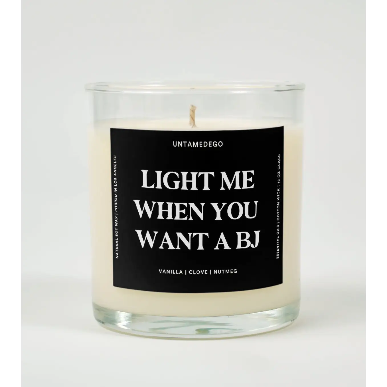 UntamedEgo LLC. Light Me When You Want A BJ Candle VANILLA + CLOVE + NUTMEG