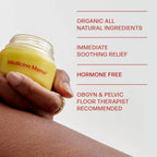 Jar of 'Medicine Mama' cream held by a hand with text about product benefits on a white background