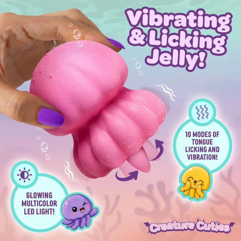 XR Brands® Creature Cuties Glow Jelly Licking & Vibrating Clitoral Stimulator Hot Pink