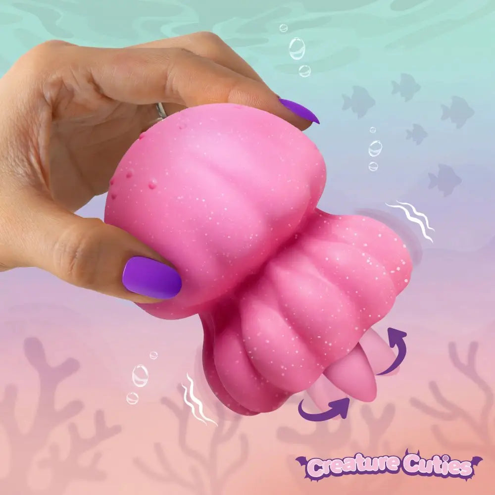 XR Brands® Creature Cuties Glow Jelly Licking & Vibrating Clitoral Stimulator Hot Pink