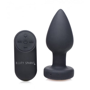 XR Brands® Booty Sparks™ Light Up Rechargeable Silicone Butt Plug Medium - Rolik®